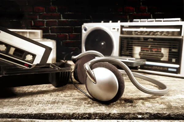 Old cassette tapes and cassette player — Stock Photo, Image