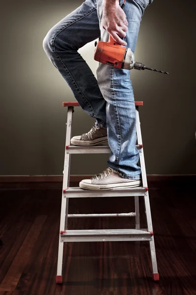 Man working on ladder — Stock Photo, Image