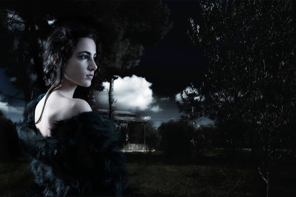 Young woman alone in the woods