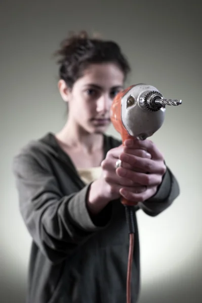 Young female with drill — Stock Photo, Image