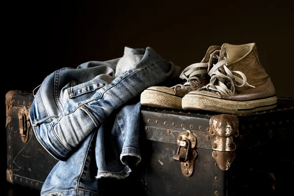 Pair of jeans and sneakers — Stock Photo, Image