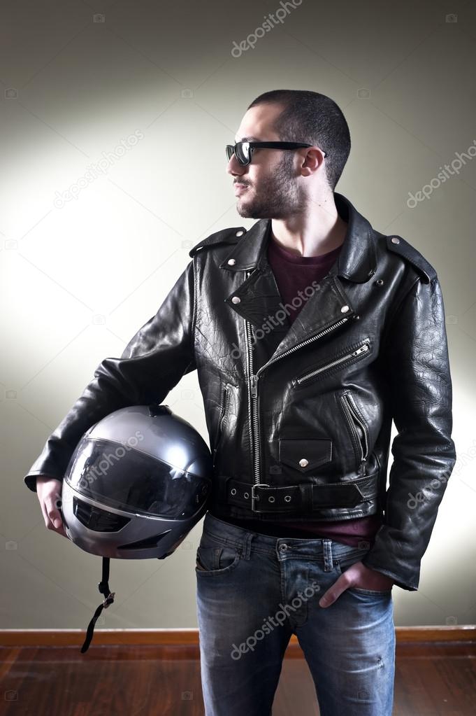 Biker in leather jacket and sunglasses