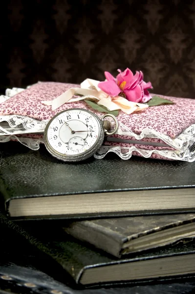 Old watch and books