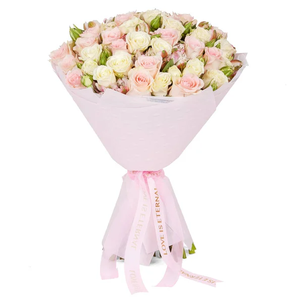 Bouquet of Soft Pink Flowers in Pink Wrapping Paper Stock Photo