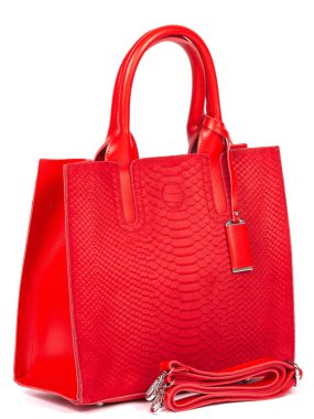 Big red leather woman's handbag isolated on white background.