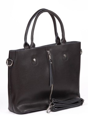 Black large with strap leather woman's handbag isolated on white background.