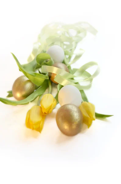 Easter golden egg tulip ribbon — Stock Photo, Image