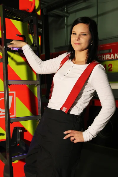 Firefighter and girls — Stock Photo, Image