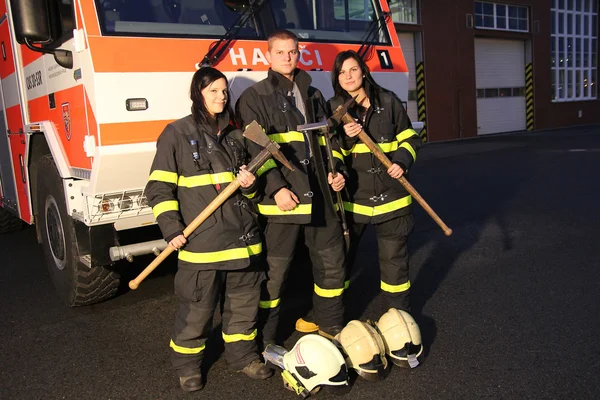 Firefighter and girls — Stock Photo, Image