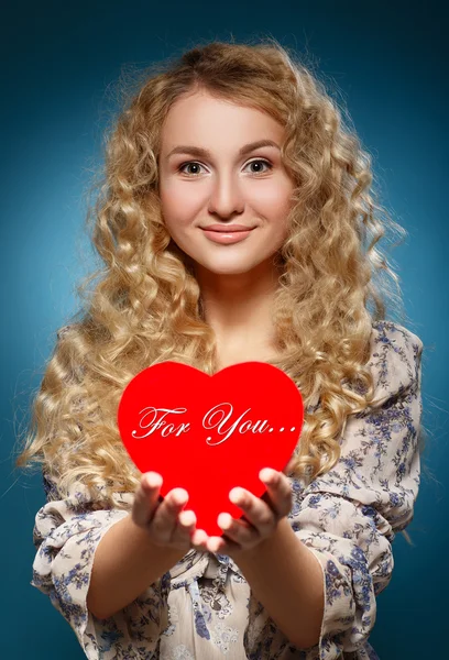 Girl with red heart. — Stock Photo, Image