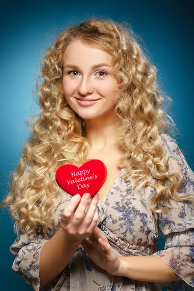 Girl with red heart. — Stock Photo, Image