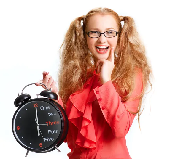 Uśmiechający się piękna dziewczyna z dużym zegarem — Zdjęcie stockowe