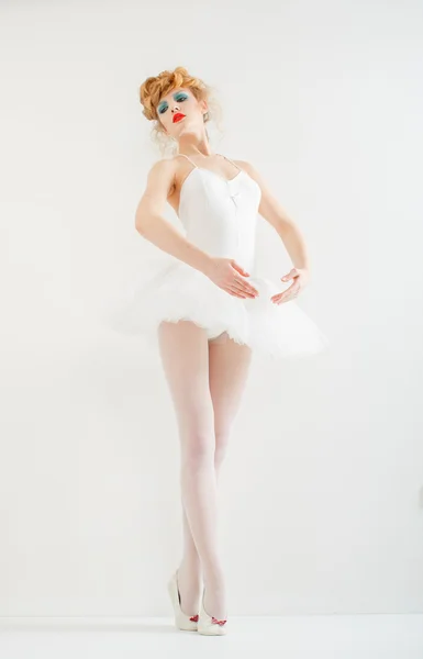 Beautiful girl dressed as a ballerina. Fashion makeup. Stylish h — Stock Photo, Image