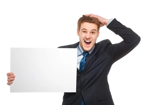 Young businessman holding a whiteboard. Concept - a crisis or a — Stock Photo, Image