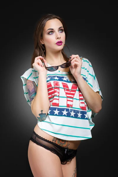 Beautiful girl with stylish make-up and tattooed arms. Tattoo — Stock Photo, Image