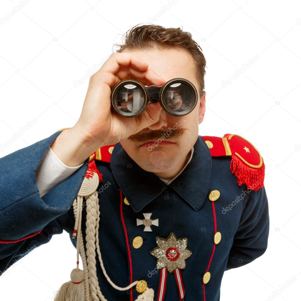 French general with beautiful mustache looking through binocular