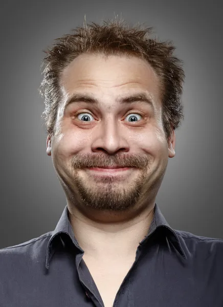 A man with a beard and mustache expression of happiness on her f — Stock Photo, Image