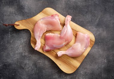 Skinless Raw chicken legs. Raw chicken legs for barbecue or soup. Fresh raw chicken legs. Top view.