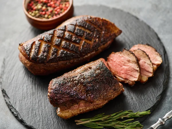 Grilled Duck Breast Black Slate Board Peppers Cherry Tomatoes — Stock Fotó