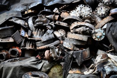 Pile of old machine parts and car spare parts. Rusty and corroded machine parts and car spare parts at Talad Noi, Bangkok, Thailand.