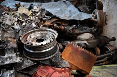 Pile of old machine parts and car spare parts. Rusty and corroded machine parts and car spare parts at Talad Noi, Bangkok, Thailand.