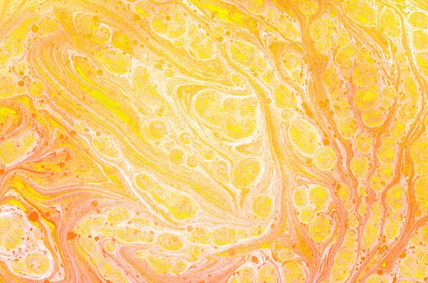 Abstract marble hand painted background in modern art style with fluid free-flowing ink and acrylic painting technique.