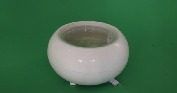 Close Placing Plastic Caps White Aroma Oil Diffuser Humidifier Green — Stockvideo