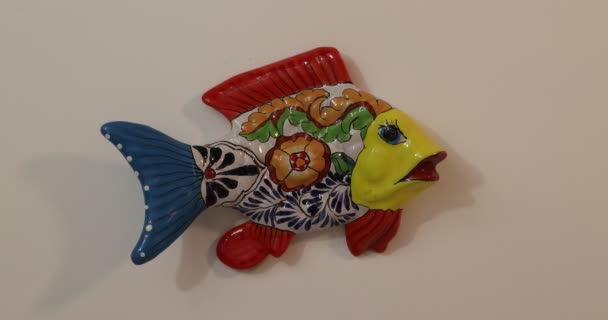 Adult Female Hands Removing Multicolored Talavera Ceramic Fish Placing Flower — ストック動画