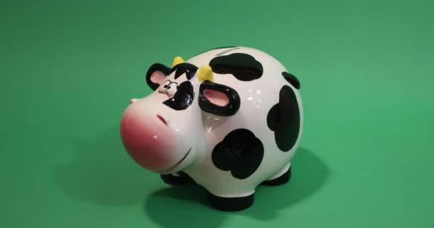 Lateral View Adult Female Hand Placing Coins Piggy Bank Shaped — Wideo stockowe