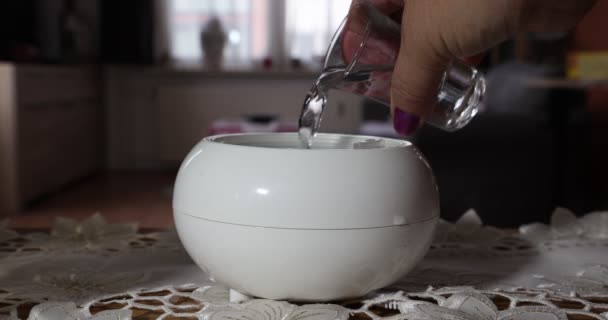 Female Hands Putting Drops Aroma Oil White Aroma Diffuser Humidifier — Vídeo de Stock