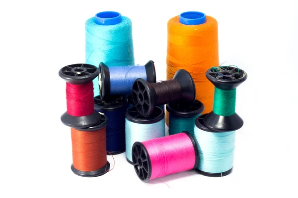 Colorful bobbins of thread isolated — Stock Photo, Image