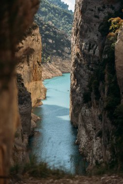Beautiful landscape of gorge with turquoise river and forest. Congost de Mont Rebei, Catalonia, Spain. clipart