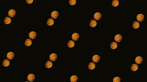 Colorful fruit pattern of fresh rotating grapefruits on black background. Seamless pattern with grapefruit. Realistic animation. 4K video motion — Stockvideo