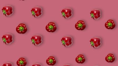 Renkli taze kırmızı biber deseni. Paprika ile kusursuz desen. Pop sanat tasarımı. Gerçekçi animasyon. 4K video hareketi