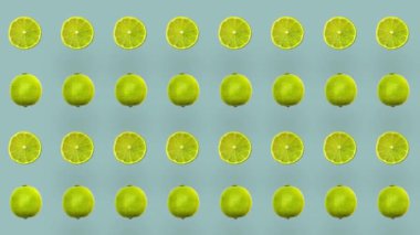 Renkli arka planda tekrarlanan limon deseni. Üst Manzara. Minimum tropikal meyve yaz konsepti. Limon dilimleriyle kusursuz desen. Gerçekçi animasyon. 4K video hareketi