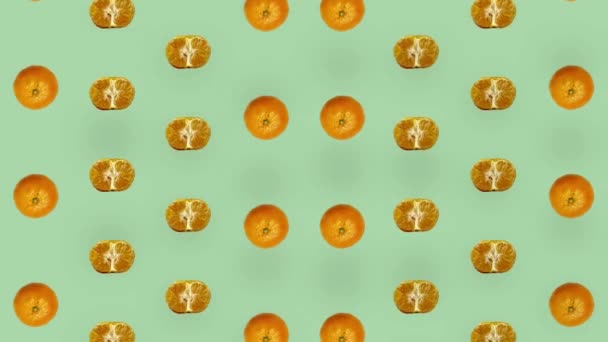 Colorful fruit pattern of fresh tangerines. Seamless pattern with tangerine. Mandarine. Pop art design. Realistic animation. 4K video motion — Stockvideo