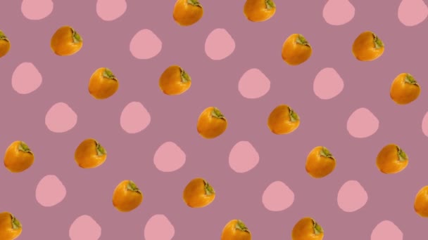 Colorful pattern of fresh orange persimmons. Top view. Seamless pattern with persimmon. Pop art design. Realistic animation. 4K video motion — Stockvideo