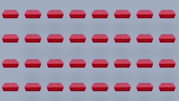 Patrón colorido de esponjas de cocina rosadas. Patrón sin costuras con esponja. Vista superior. Animación realista. Movimiento de vídeo 4K — Vídeos de Stock