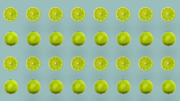 Pattern of limes repeated over colorful background. Top view. Minimal tropical fruit summer concept. Seamless pattern with lime slices. Realistic animation. 4K video motion — Vídeo de Stock