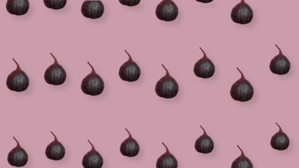 Colorful fruit pattern of fresh figs on pink background with shadows. Seamless pattern with fig. Realistic animation. 4K video motion — Stockvideo