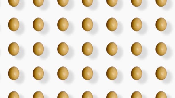 Patrón colorido de huevos de pollo. Patrón sin costura con huevo. Vista superior. Animación realista. Movimiento de vídeo 4K — Vídeo de stock