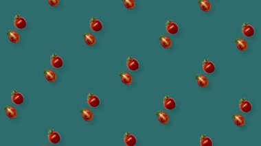 Değişen kırmızı domateslerin renkli deseni. Kiraz domatesli kusursuz desen. Gerçekçi animasyon. 4K video hareketi
