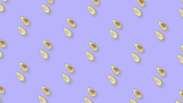 Colorful fruit pattern of fresh rotating avocados. Seamless pattern with avocado. Realistic animation. 4K video motion — Stock Video
