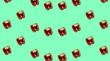 Yeşil arka planda taze kırmızı biber deseni. Paprika ile kusursuz desen. Gerçekçi animasyon. 4K video hareketi