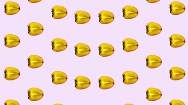 Pembe arka planda taze turuncu hurma deseni. Hurma dilimlenmiş kusursuz desen. Gerçekçi animasyon. 4K video hareketi