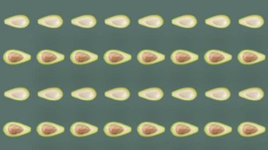 Taze avokadoların renkli deseni. Üst Manzara. Minimum tropikal meyve konsepti. Avokado dilimlenmiş kusursuz desen. Pop sanat tasarımı. Gerçekçi animasyon. 4K video hareketi