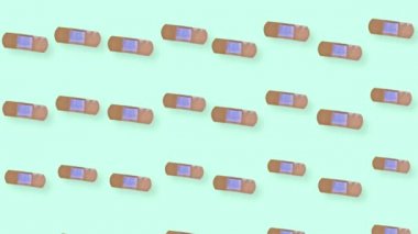 Yapışkan alçıların renkli deseni. Alçıyla kusursuz desen. Üst Manzara. Gerçekçi animasyon. 4K video hareketi