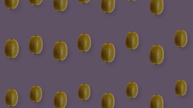 Taze kivinin renkli meyve deseni. Kiviyle kusursuz desen. Gerçekçi animasyon. 4K video hareketi