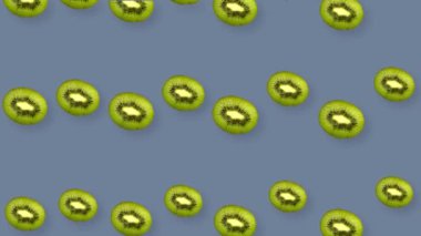 Renkli kivi deseni. Üst Manzara. Minimum tropikal meyve konsepti. Kivi dilimlenmiş kusursuz desen. Pop sanat tasarımı. Gerçekçi animasyon. 4K video hareketi