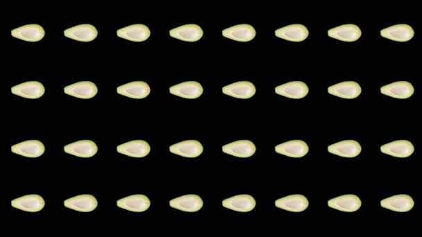 검은 배경에 화려 한 색상의 신선 한 아보카도 무늬가 있다. 아보카도가 있는 무뚝뚝 한 무늬. 리얼리티 애니메이션. 4K 비디오 모션 — 비디오